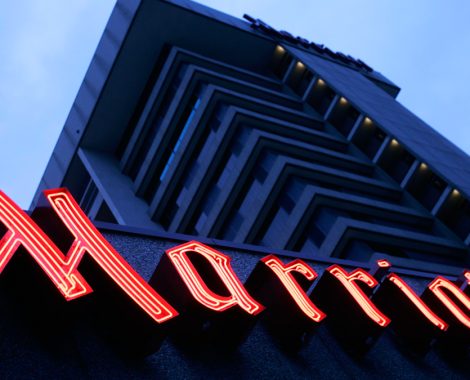 The Marriott sign glows outside the hotel Saturday, Feb. 4, 2006, in Salt Lake City. Hotel operator Marriott International Inc. on Thursday said fourth-quarter profit jumped 25 percent as the company saw robust revenue from its group, commercial and leisure traveler segments. The Bethesda, Maryland-based company has more than 2,700 lodging properties located in the United States and around the world. (AP Photo/Douglas C. Pizac)
